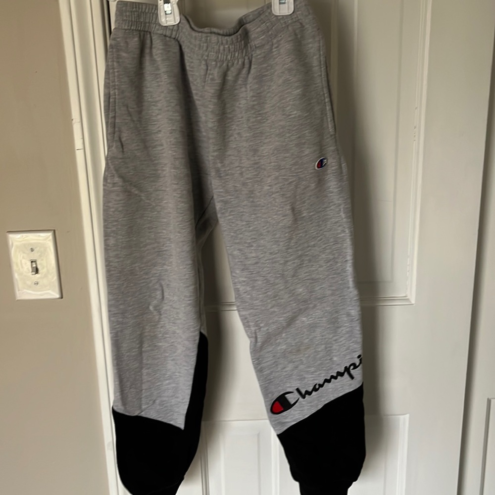 Boys large Champion sweatpants with pockets light stain above logo